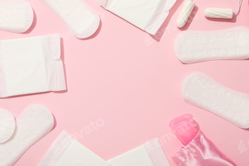 Preview: Menstrual feminine hygiene products on a pink background
