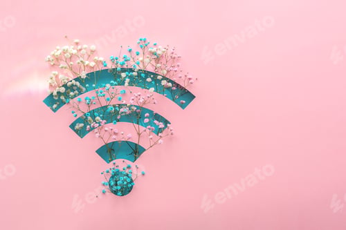 Preview: Creative concept of spring. Radio waves with flowers on a pink background.