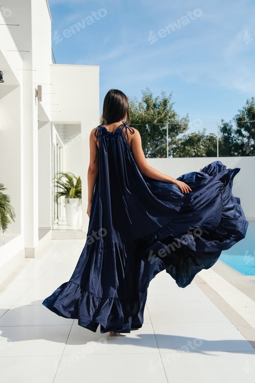 Preview: Fashion Outdoor Photo Of Beautiful Young Woman With Dark Hair In Luxurious Summer Dress Relaxing