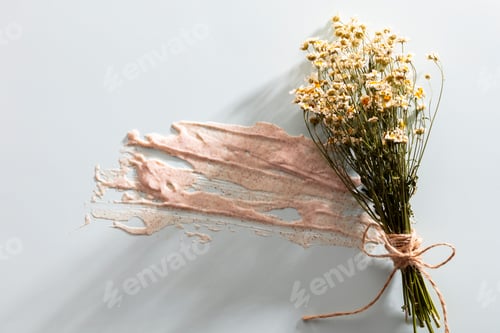 Preview: Spa herbal cosmetic scrub on a blue background. Natural medicine concept. Flat lay style