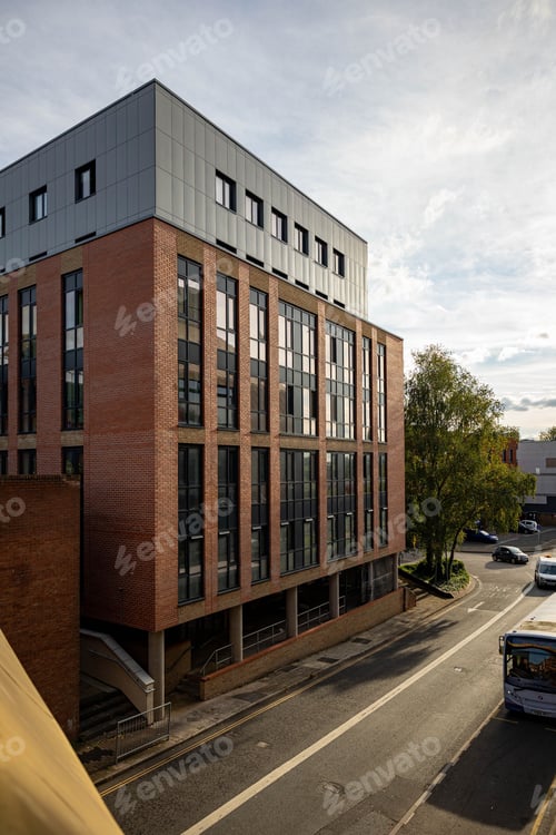Preview: Modern urban building with brick facade.