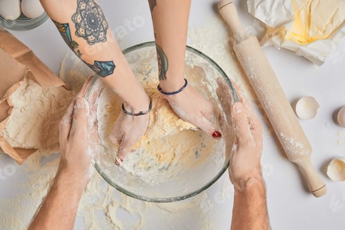 Preview: cropped image of chefs kneading dough