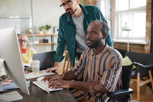 Preview: Business people working with presentation on computer