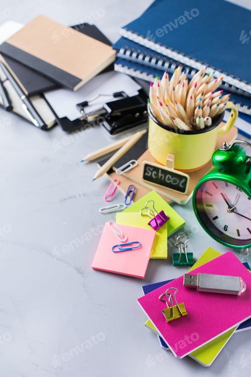 Preview: Assortment of school supplies, crayons, pens, chalks