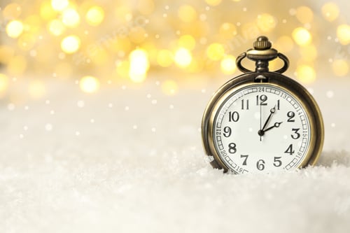 Preview: Pocket watch with snow on a light background.