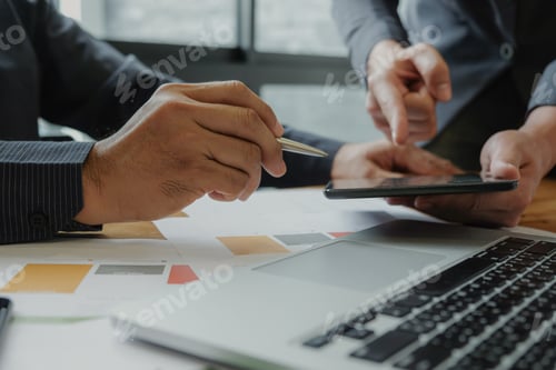 Preview: Two businessmen are planning work to achieve organizational goals.