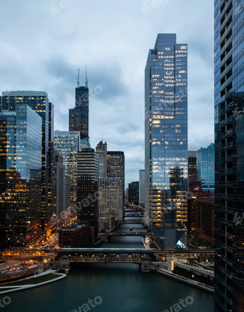 Preview: Vertical shot of downtown city buildings and skyline over the Chicago River, Illinois, USA
