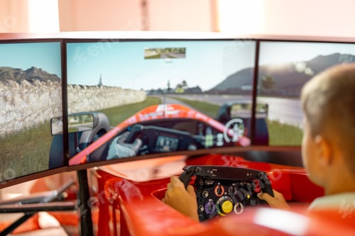 Preview: Boy plays on formuls simulator