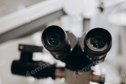 Preview: Dental Microscope on a background of a modern clinic closeup.