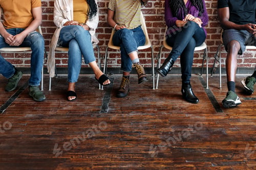 Preview: People sitting on their chairs