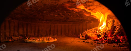 Preview: Pizza is cooked in the oven.