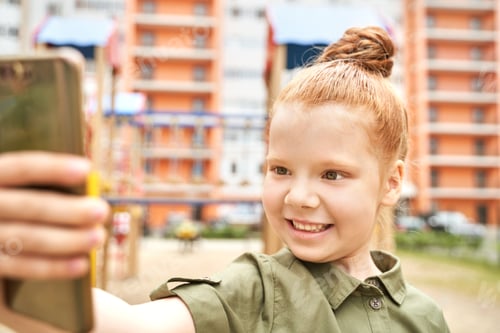 Preview: Kid at playground. Pretty face. Cute school child. Active vacation