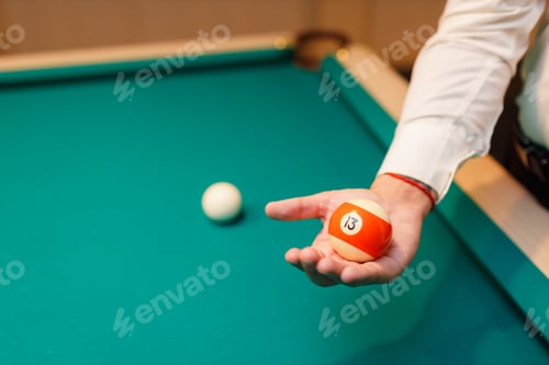Preview: Billiard player at billard table or snooker american billiards pool sport game