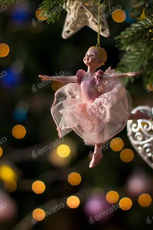 Preview: Ballerina toy figurine on Christmas tree. Holiday background.