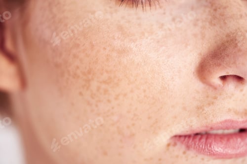 Preview: Close up of woman's face with freckles