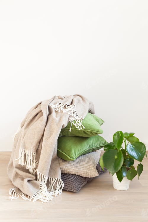 Preview: gray and green cushions cozy home