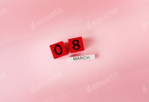 Preview: Wooden cubes with the inscription March 8 on a pink background, the inscription of a happy women's