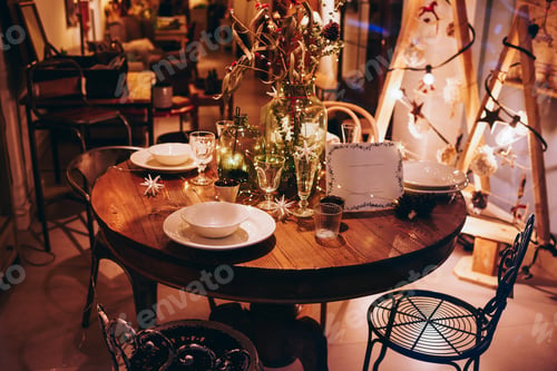 Preview: Served table for Christmas dinner in cozy restaurant