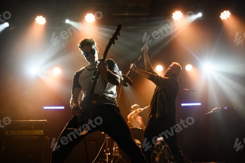 Preview: Guitarist and singer performing with passion on stage