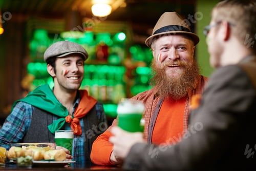 Preview: Men relaxing in bar