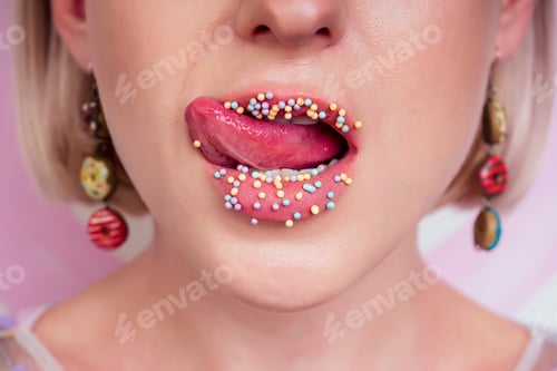 Preview: portrait of beautiful blonde Barbie woman perfect makeup tongue sexy licking lip