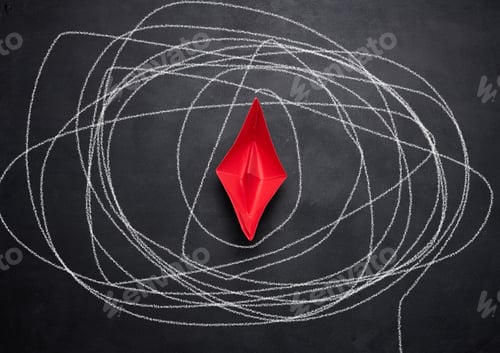 Preview: Red paper boat on a black chalkboard and a long drawn path in white chalk.