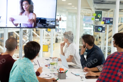 Preview: Diverse business people attending video conference