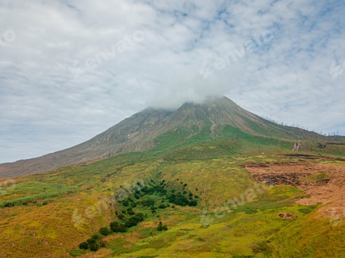Preview: Aerial drone view of Mount Sinabung at Berastagi in North Sumatra, Indonesia.