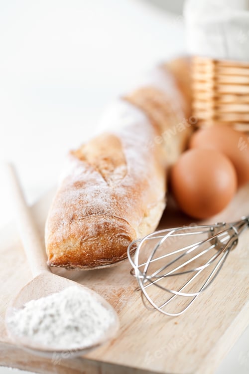 Preview: still life of bread, flour, eggs and kitchen utensil