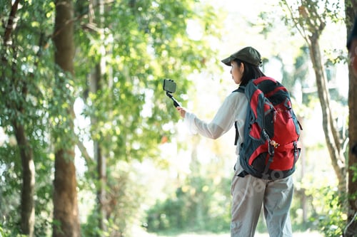 Preview: Young Asian Woman with Backpack Smiling on Summer Vacation