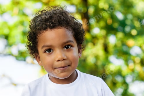 Preview: Close up of a happy african boy looking at the camera.