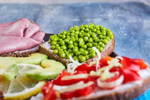 Preview: Assorted open-faced sandwiches, sandwiches with slices of sourdough with various fillings on plate