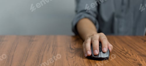 Preview: Male hand holding computer mouse with copy space
