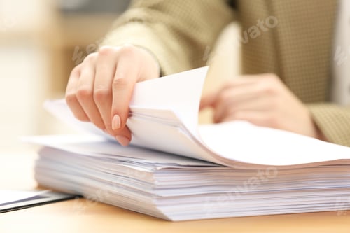 Preview: Woman working with documents at table in office, closeup