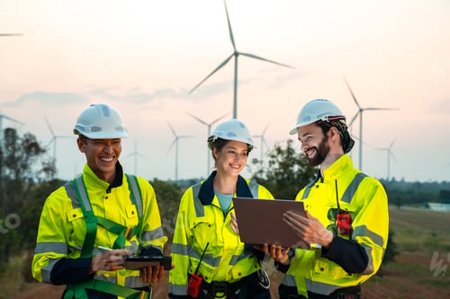 Preview: Engineer at Renewable Energy Windmill Farm, Wind Power for Sustainable Electricity Generation