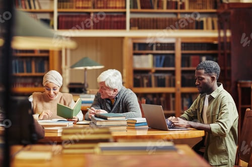 Preview: Young Man Studying in Library