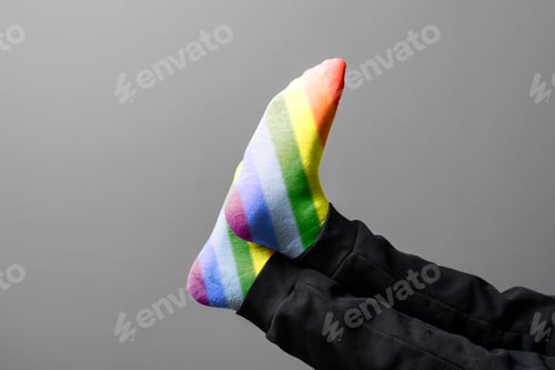 Preview: person wearing rainbow colored socks, symbol of freedom and diversity