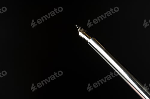 Preview: Close up of a pen on black background