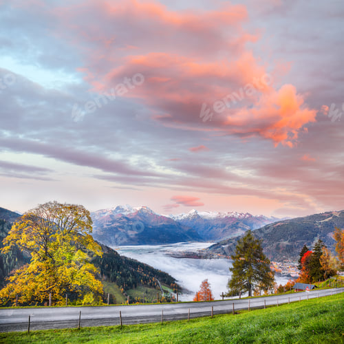 Preview: Astonishing autumn view of lake meadows trees and mountains in Sell Am See