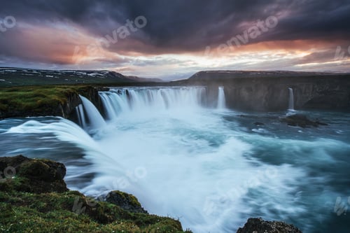 Preview: The picturesque sunset over landscapes and waterfalls. Kirkjufell mountain, Iceland