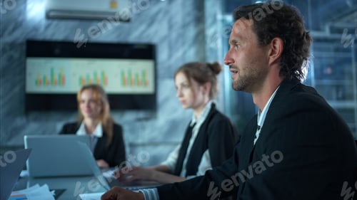 Preview: In the conference room, a group of businesspeople are discussing the follow-up meeting