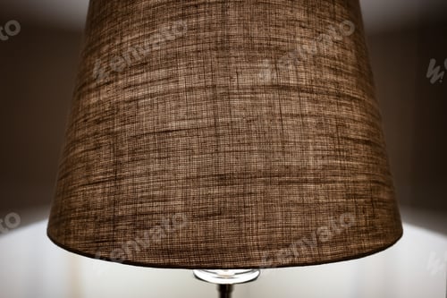 Preview: Beige shade of the floor lamp dims the light and creates a calm atmosphere in the bedroom.