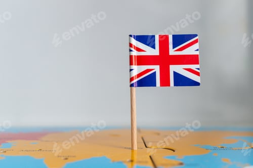 Preview: Small flag of the on a wooden stick fixed on the globe
