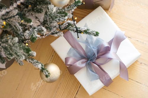 Preview: Christmas Presents Under a Decorated Holiday Tree