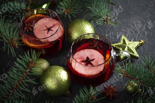 Preview: Two Glass Mugs of Mulled Wine with Christmas Decor and Fairy Lights