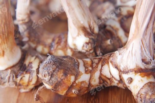 Preview: Close up of thai Gingers on chopping board.
