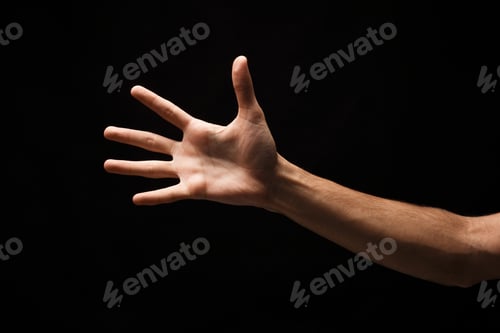 Preview: Taking hand isolated on black background