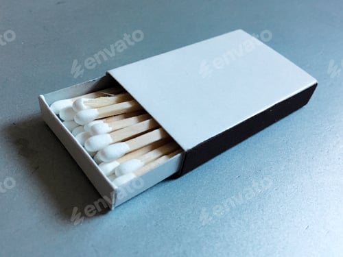 Preview: A white box of matches in a white box on a white background.
