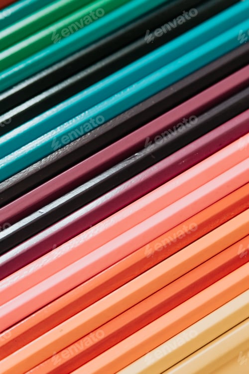 Preview: Close up of multicolored pencils close up, background minimal