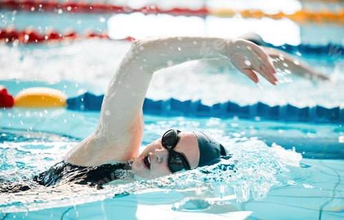Preview: Woman, pool and swimming in water for sports fitness, exercise or training in olympic or athletics.
